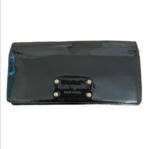 Kate Spade navy patent continental wallet.